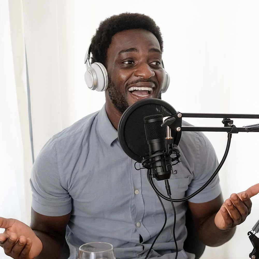 Multiracial people recording a podcast using micro yxhmy5l.jpg